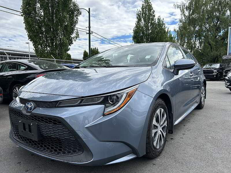 2022 Toyota Corolla used pre-owned, Ext:Blue, int:Black, Hybrid Cvt W-Li, 36888. Pioneer Motors Langley. BJ1784-1
